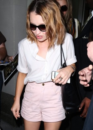 Emily Browning in Shorts Arrives in NY