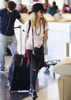 Emma Roberts in Tight Jeans at LAX in LA
