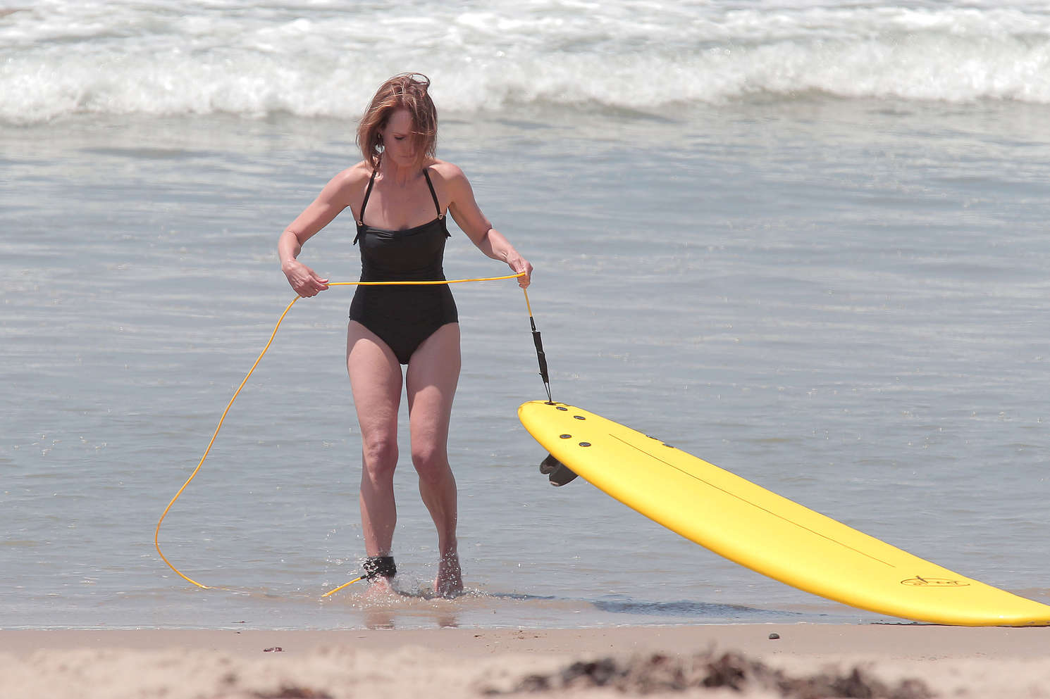 Helen Hunt - wearing a swimsuit on the set of 'Ride' in LA. 