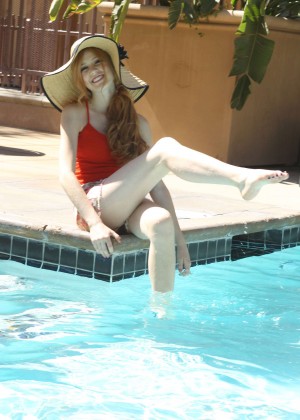Katherine McNamara in Shorts - Photoshoot by a pool in Los Angeles