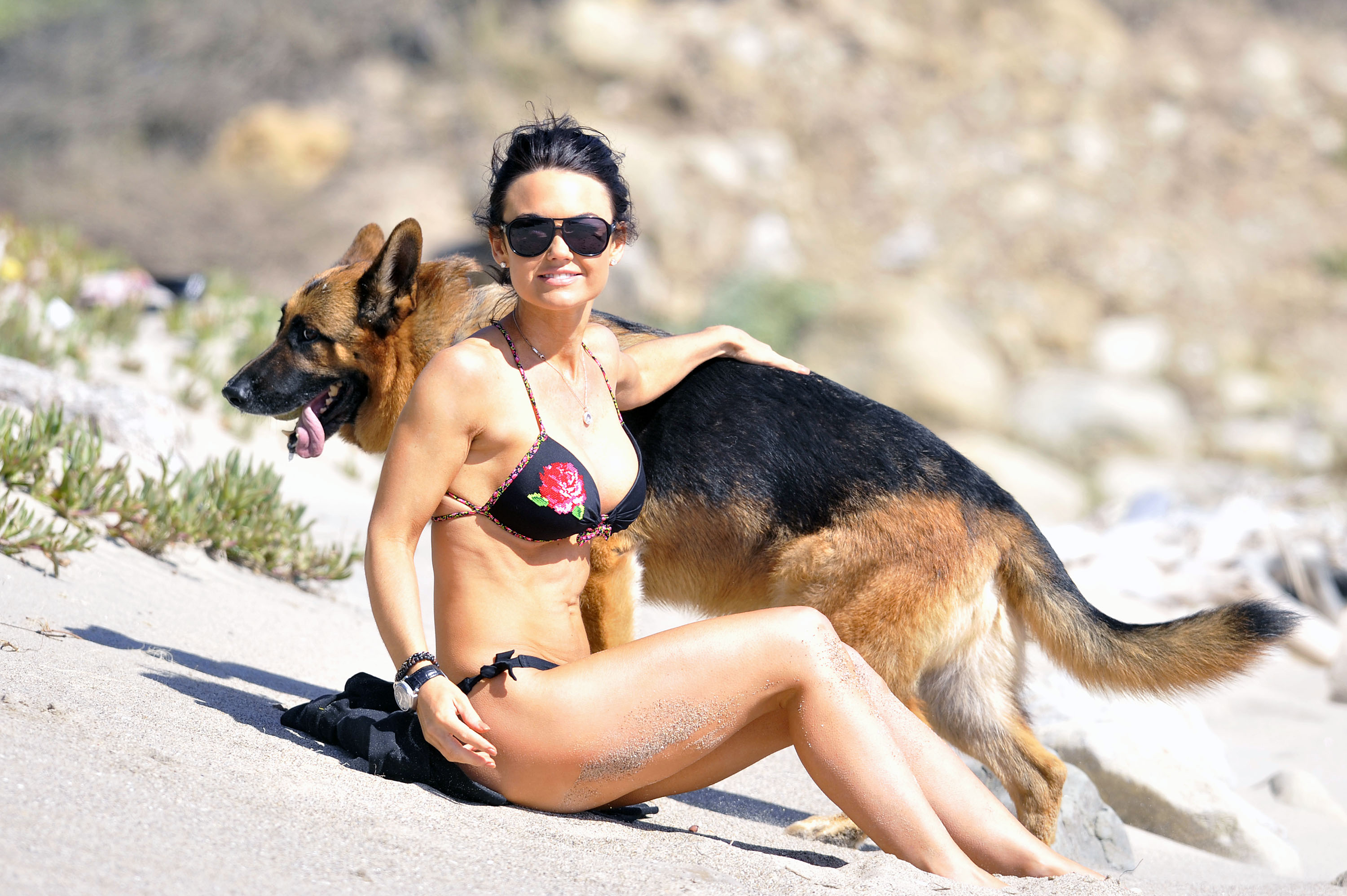 Kelly Carlson - Bikini Candids at a beach in Malibu. 