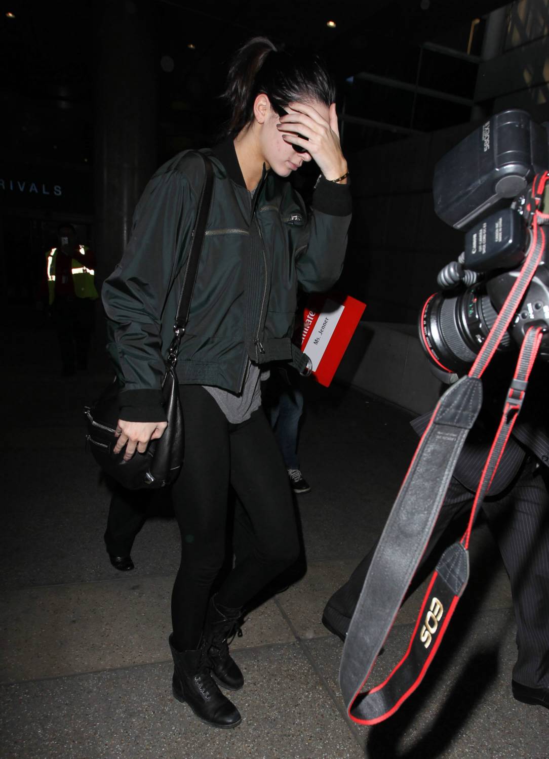 Kendall Jenner in Leggings at LAX -02 | GotCeleb