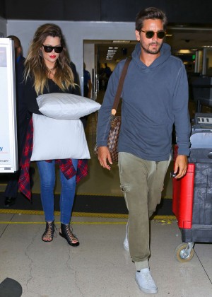 Khloe Kardashian with Scott Disick Arriving on a flight at LAX airport