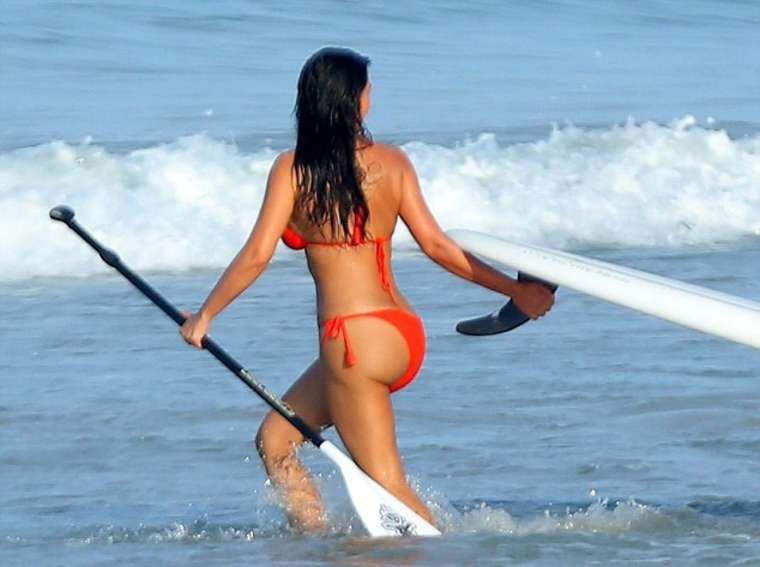 Kim Kardashian Paddleboarding in Red Bikini -07.