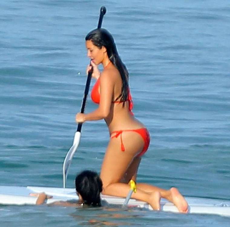 Kim Kardashian 2014 : Kim Kardashian Paddleboarding in Red Bikini -20. 