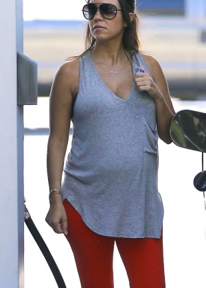 Kourtney Kardashian in Red Leggings at a gas station in LA
