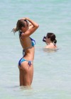 Lauren Stoner Show her sexy body in a bikini at the beach in Miami
