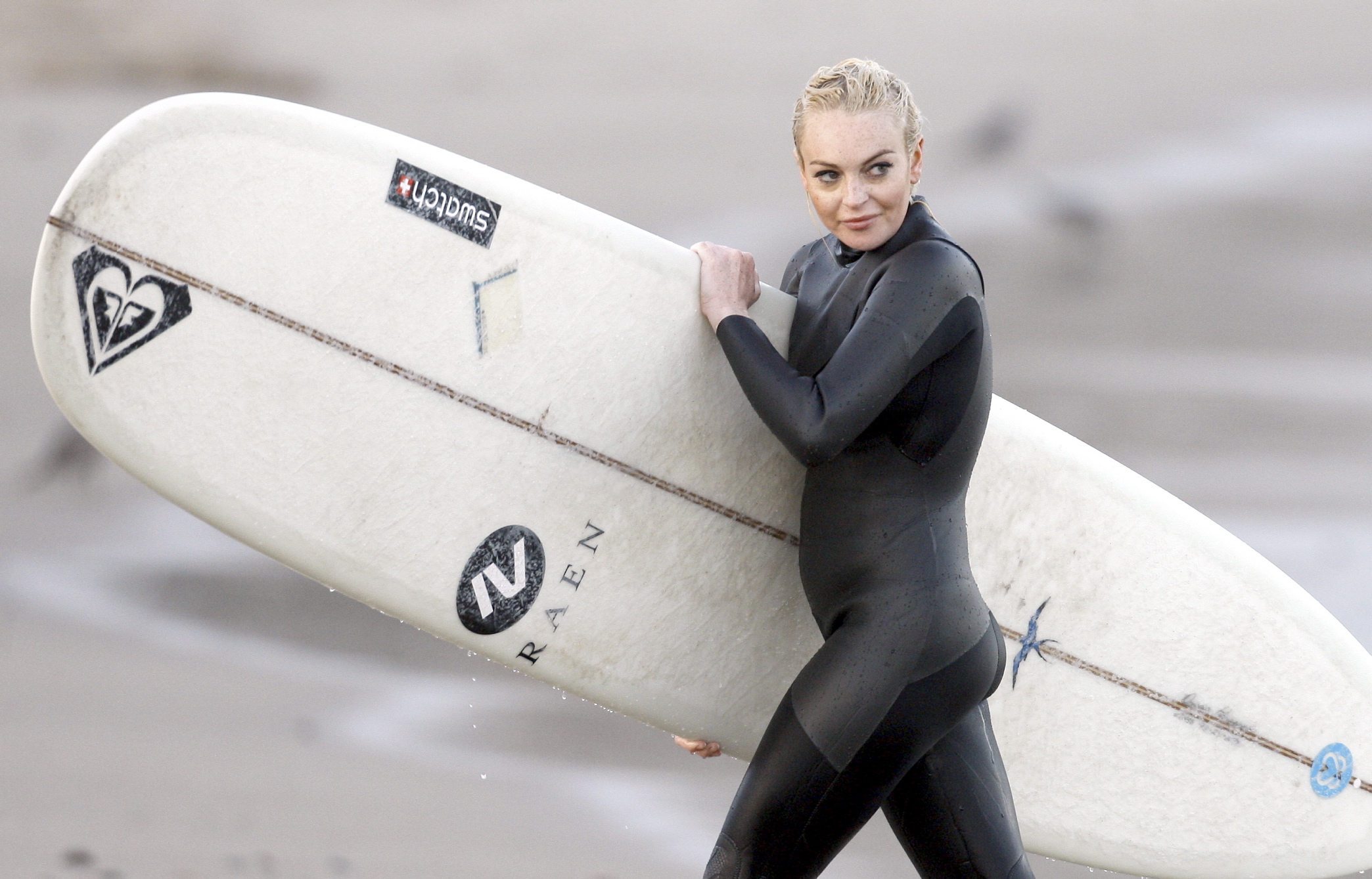 Lindsay Lohan 2011 : Lindsay Lohan In Wetsuit Surfing in Malibu-16. 
