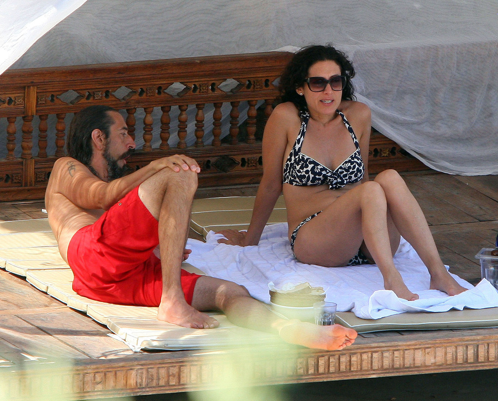 Lisa Edelstein - Bikini candids by a pool in Italy. 