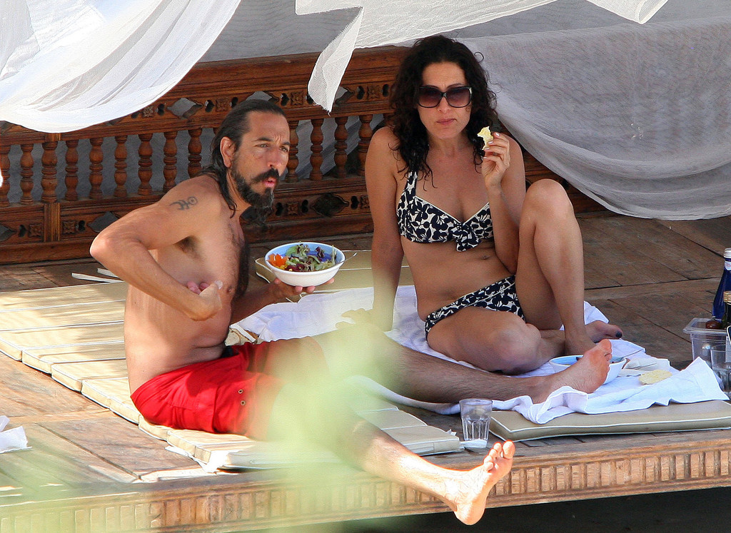 Lisa Edelstein - Bikini candids by a pool in Italy. 