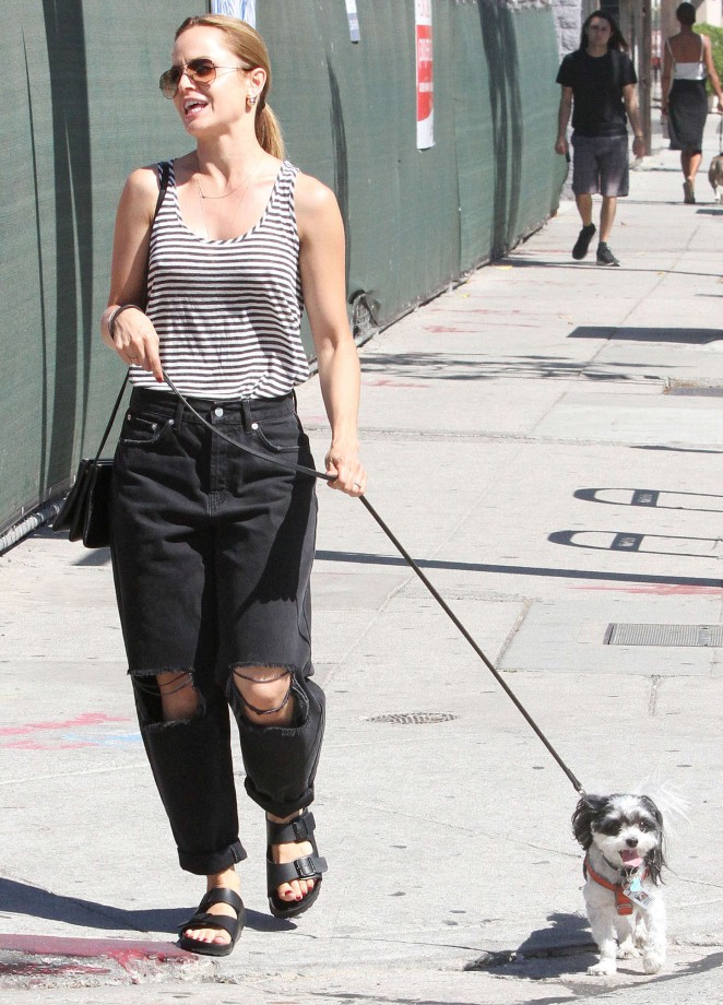 Mena Suvari in Ripped Pants Out walking her dog in Los Angeles
