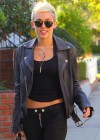 Miley Cyrus - In leather jacket and pants