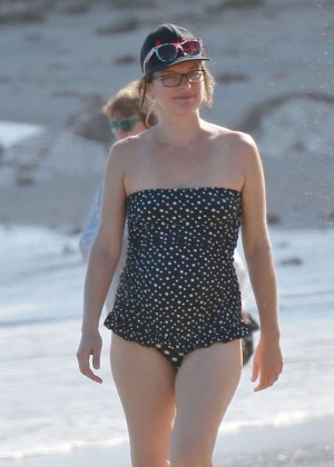 Milla Jovovich in Swimsuit on the Beach in Malibu