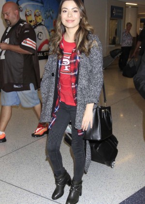 Miranda Cosgrove in Tight Jeans at LAX Airport in LA
