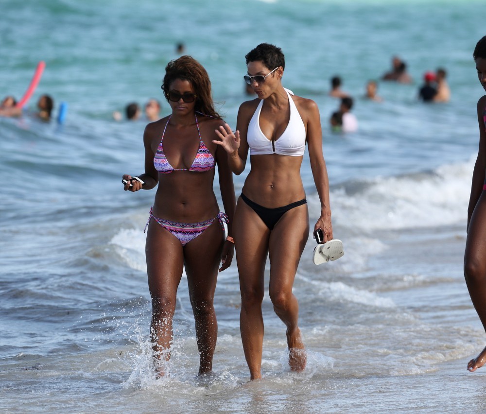 Nicole Mitchell and Claudia Jordan - Bikinis Candids in Miami. 