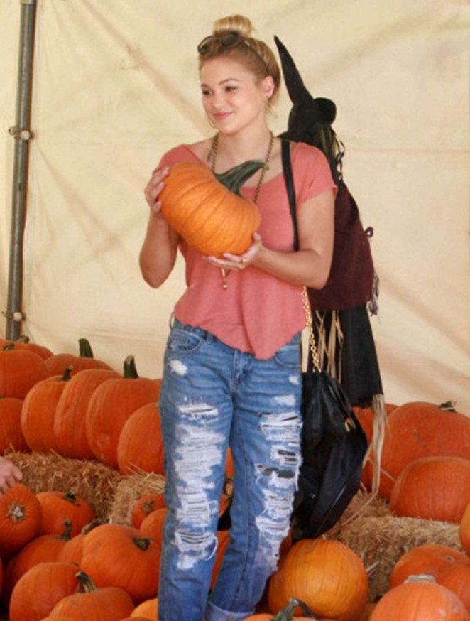 Olivia Holt in Ripped Jeans at Mr. Bones Pumpkin Patch in West Hollywood