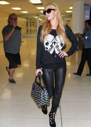 Paris Hilton in Leather Pants at LAX Airport in LA