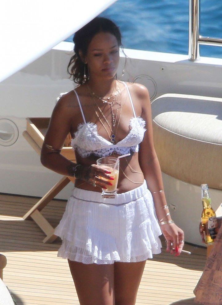 Rihanna in White Mini Dress out in Corsica