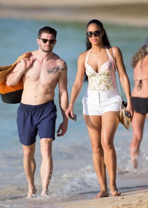 Sarah-Jane Crawford in Swimsuit and Shorts on The Beach in Barbados