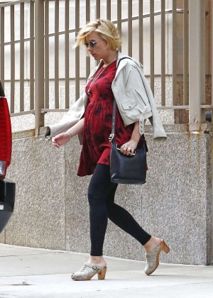 Scarlett Johansson - showing her baby bump while leaving her apartment in New York