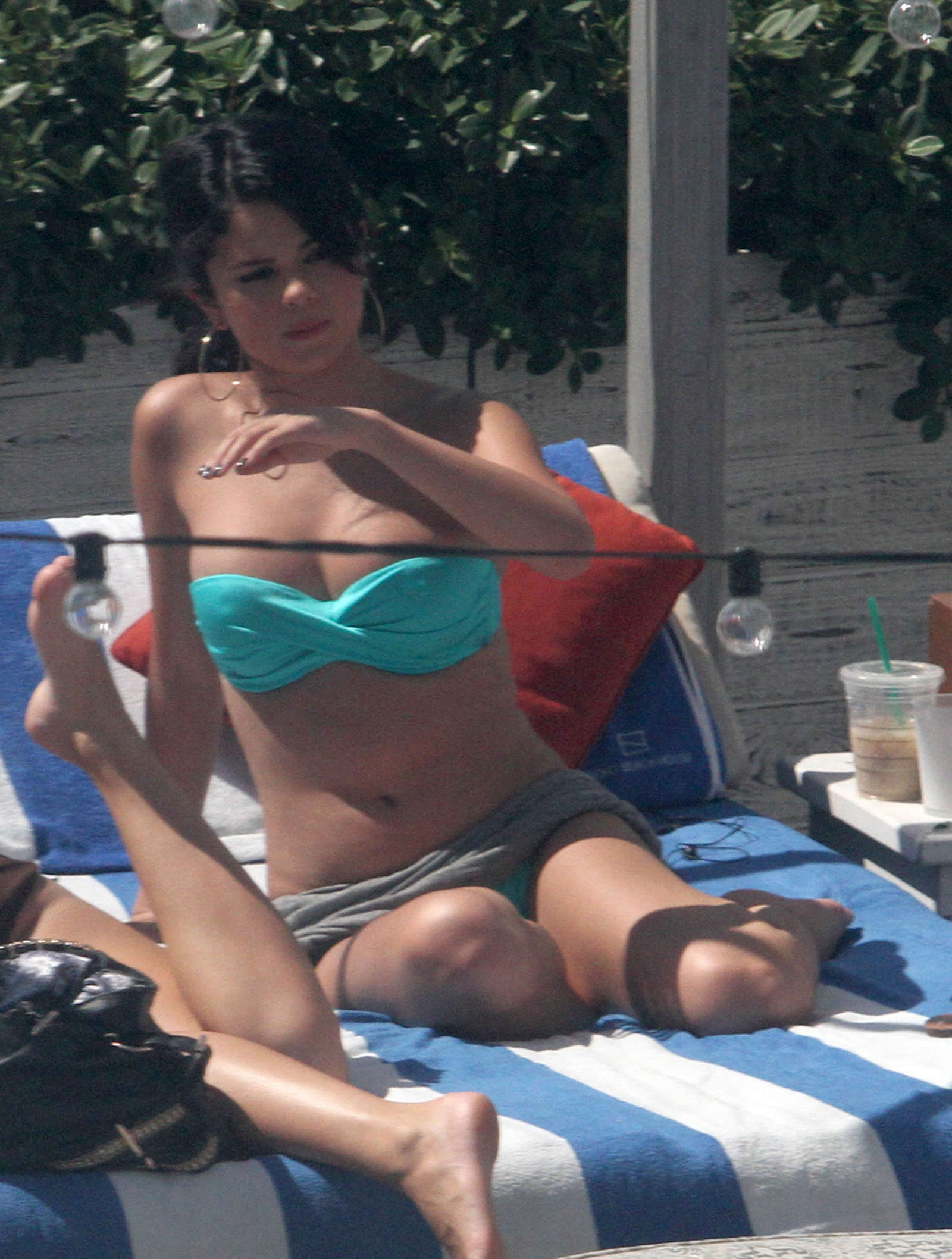 Selena Gomez - Bikini at the pool in Miami (adds). 