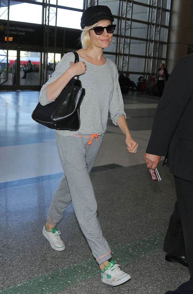 Sienna Miller in Sweats at LAX Airport in Los Angeles