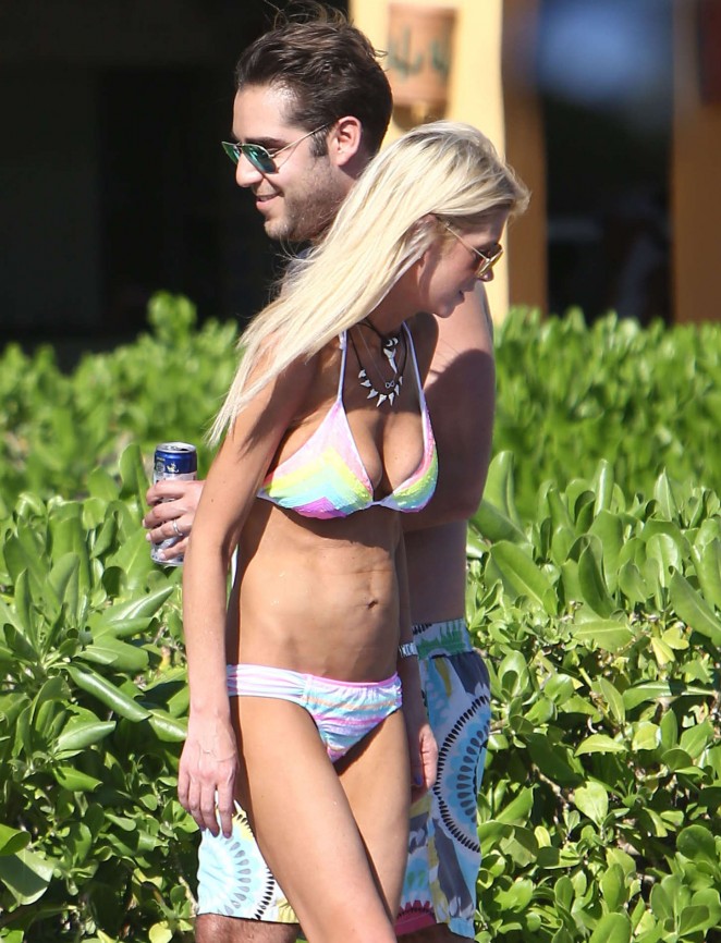 Tara Reid in Bikini on a pool in in Hawaii
