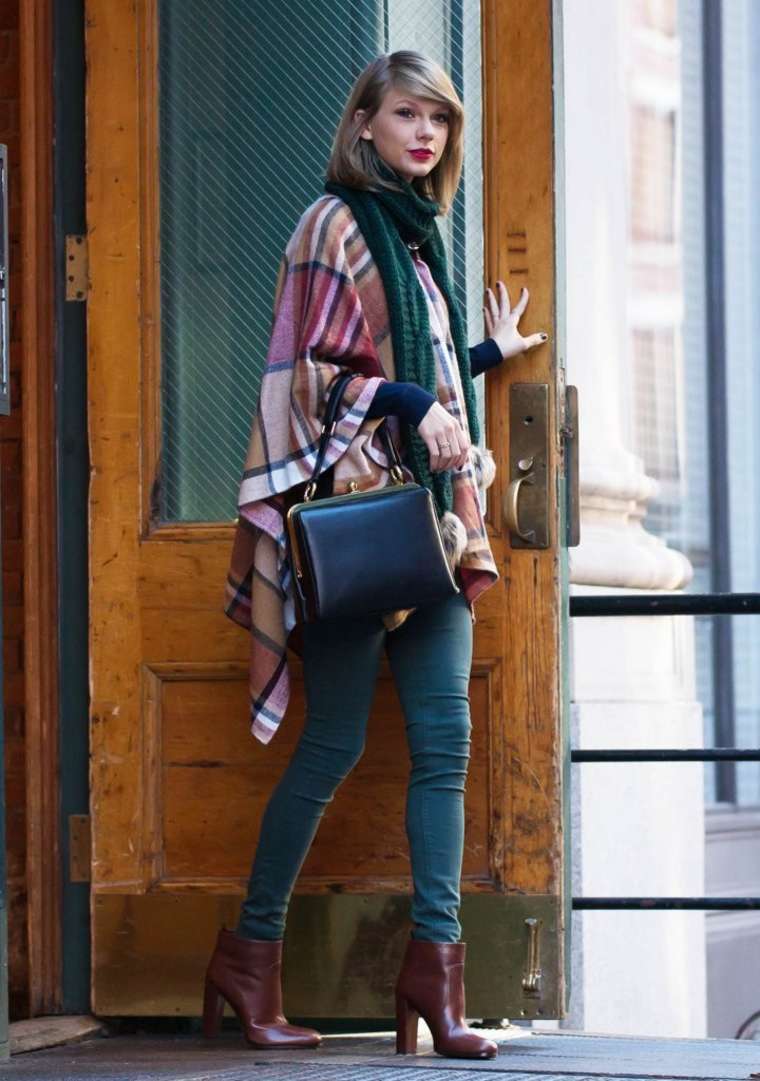Taylor Swift in Tight Jeans and Poncho -01 | GotCeleb