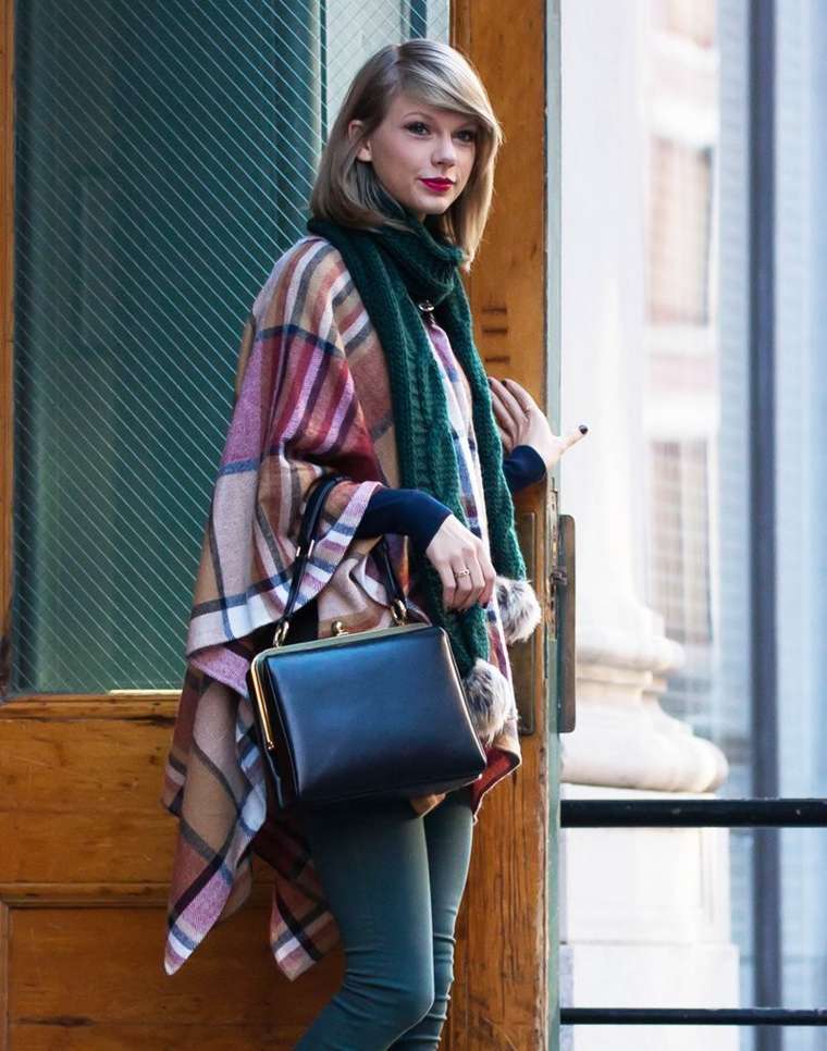 Taylor Swift in Tight Jeans and Poncho -06 | GotCeleb