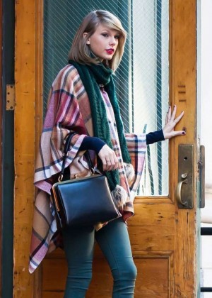 Taylor Swift in Tight Jeans and Poncho -01 | GotCeleb
