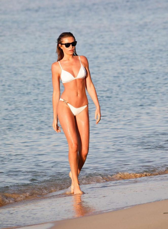 Abbey Clancy in White Bikini at the beach in Mallorca
