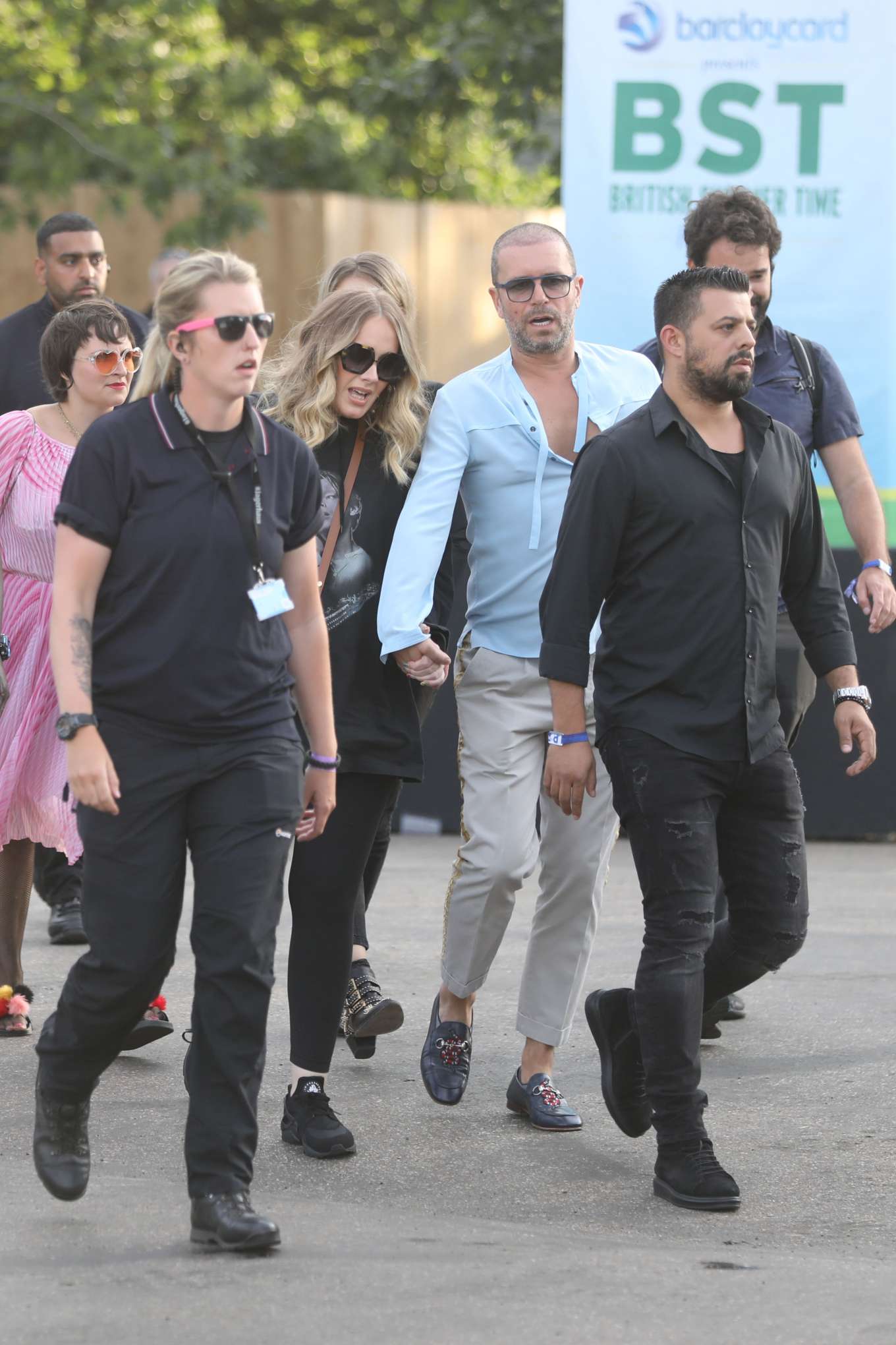 Adele â€“ Holds Hands with a male Friend en Route to watch Celine Dion in London