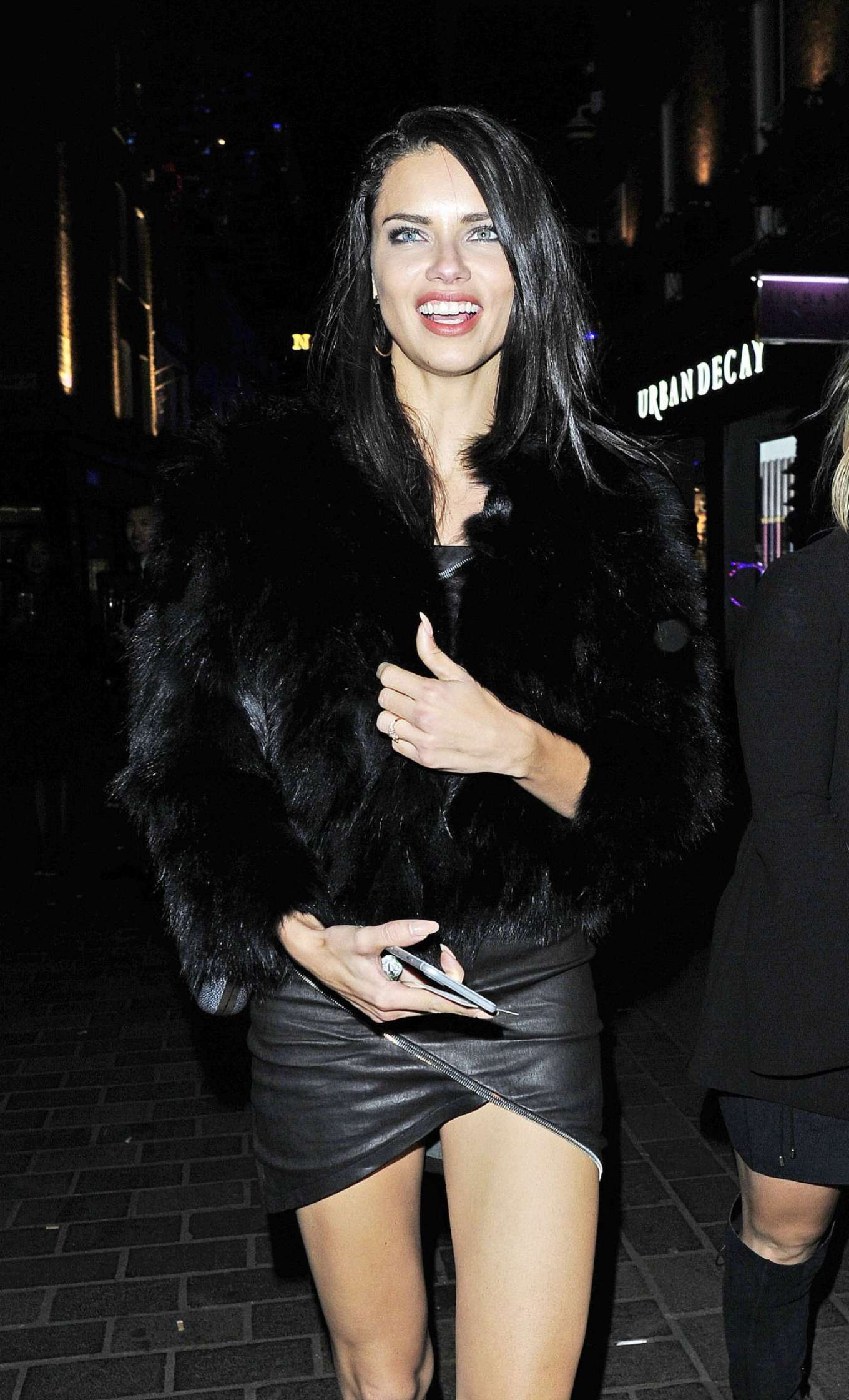Adriana Lima in Short Leather Dress Night Out in London | GotCeleb