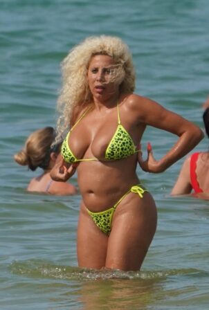 Afida Turner - in a tiny yellow bikini in Miami Beach