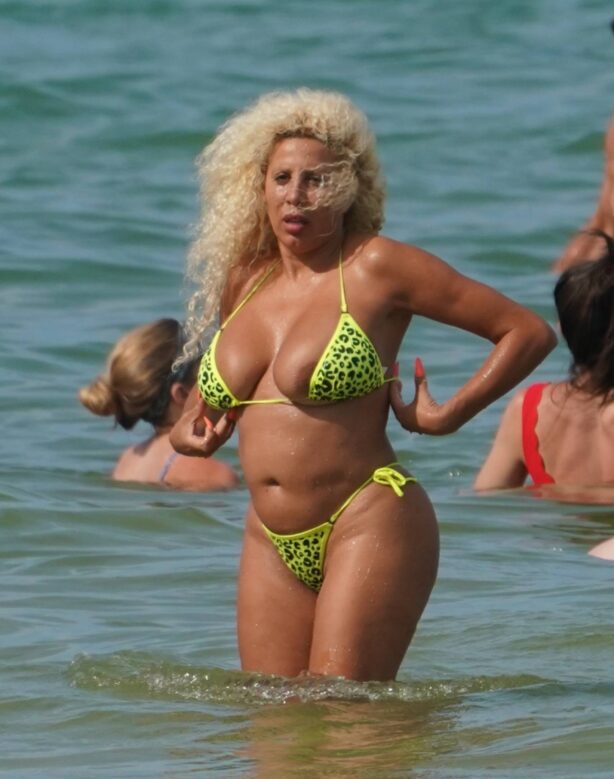 Afida Turner - in a tiny yellow bikini in Miami Beach