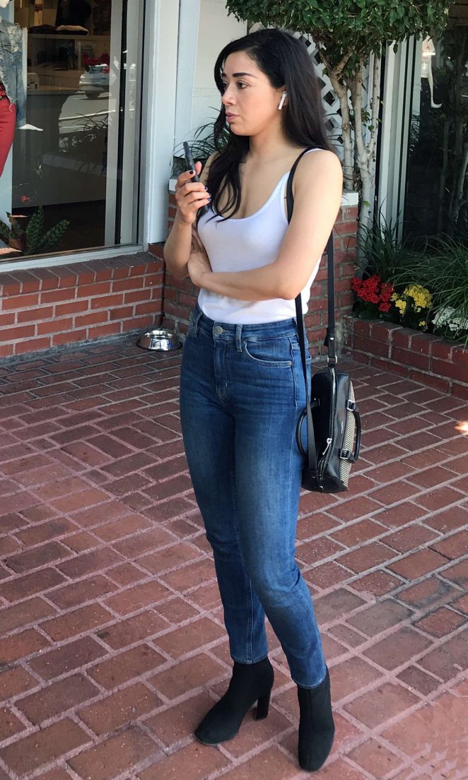 Aimee Garcia in a white tank top and denim jeans at Fred Segal in West Hollywood