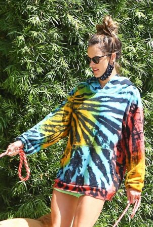 Alessandra Ambrosio in colorful tie-dye sweater while walking her dogs in Brentwood