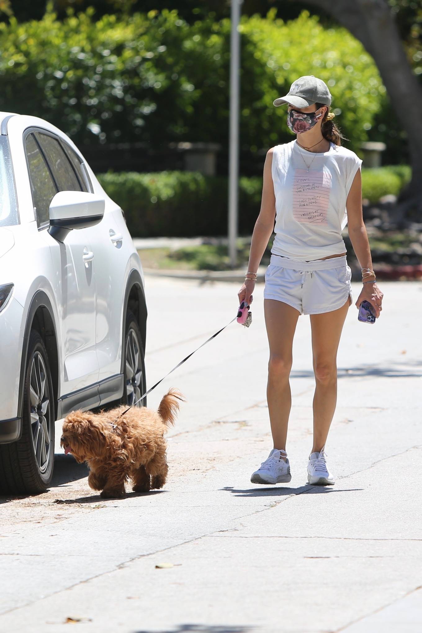 Alessandra Ambrosio - Wearing white shorts while walking her dog in ...