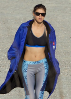 Alexandra Daddario in Tights and Sports Bra on the set of 'Baywatch' in Tybee