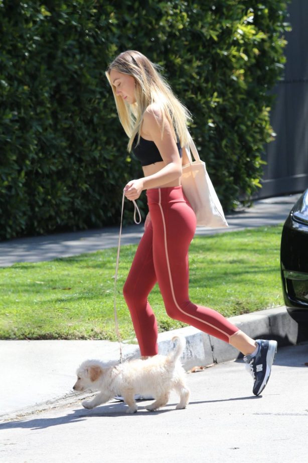 Alexis Ren - Seen after workout session with her puppy in Los Angeles