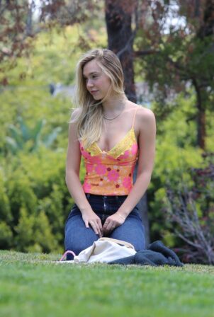 Alexis Ren - Spotted with her pup Angel in a local park in Los Angeles