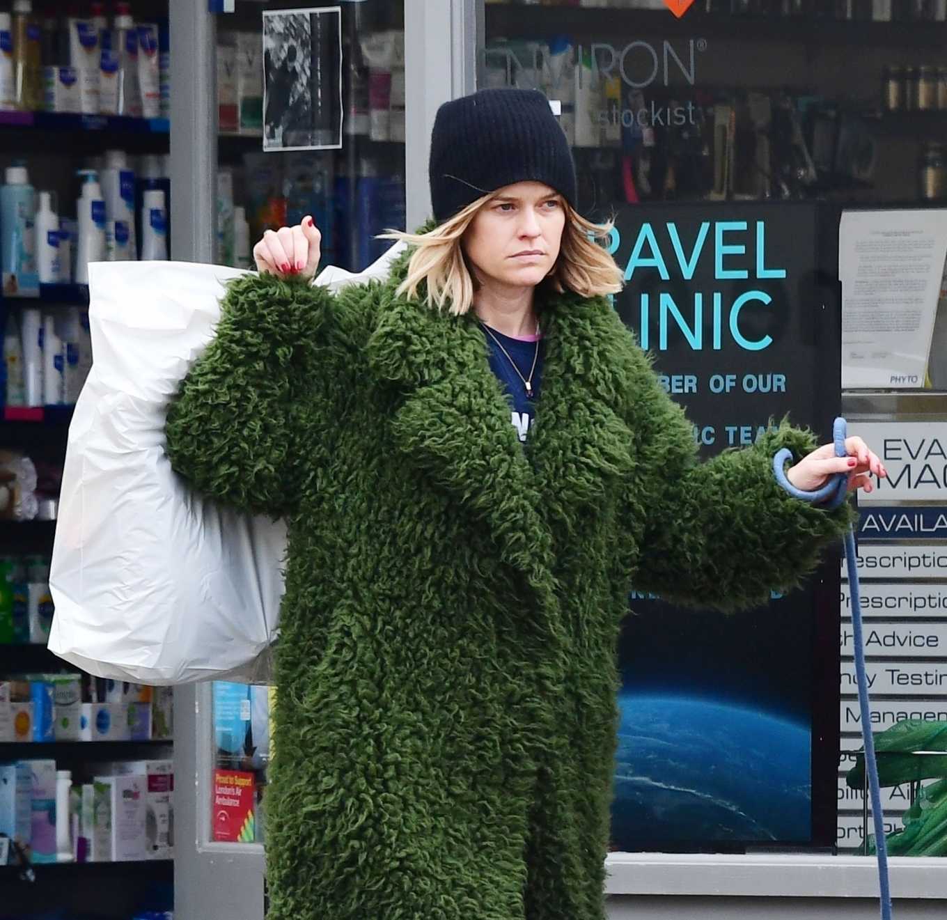 Alice Eve in Green Fur Coat â€“ Out in Notting Hill