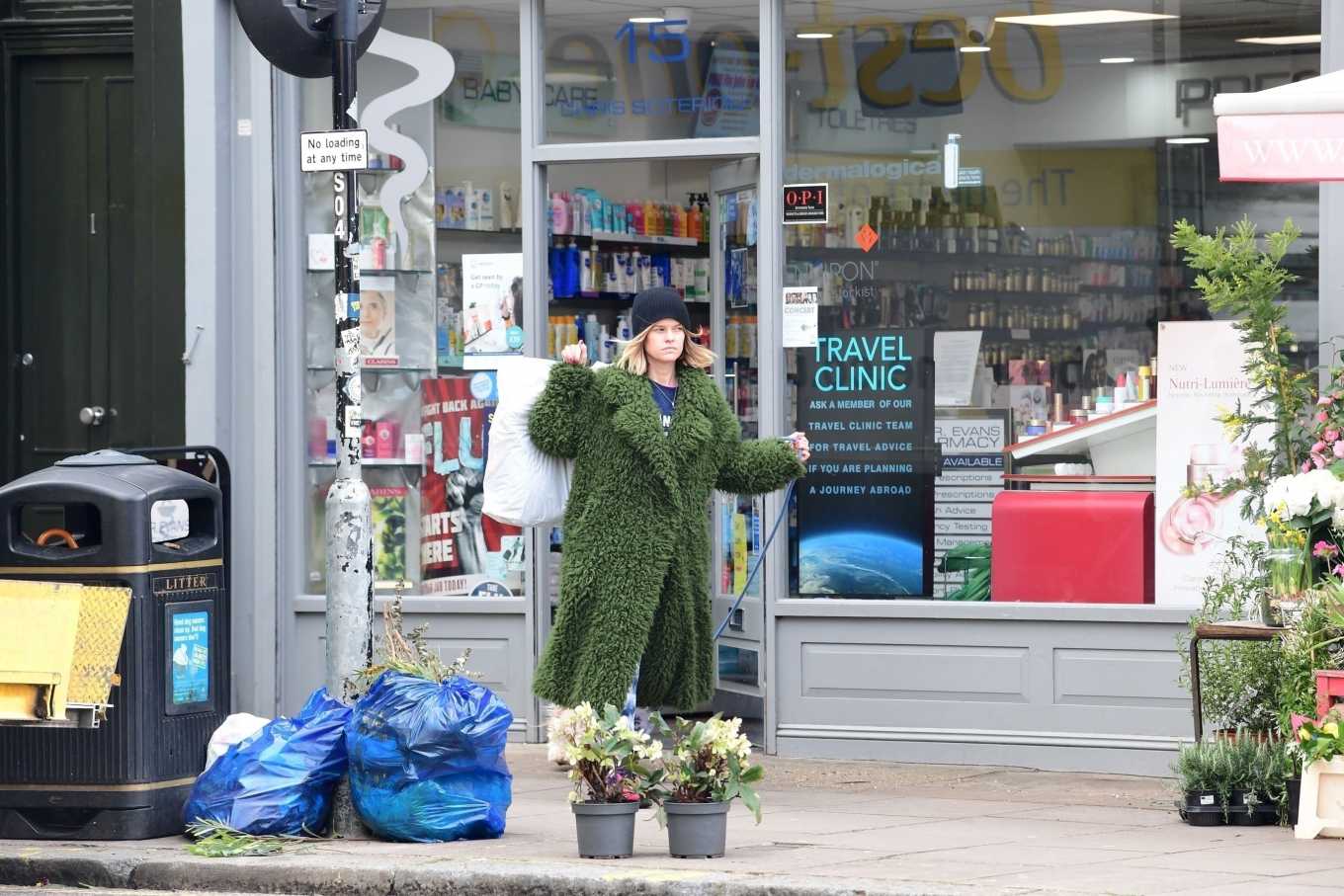 Alice Eve in Green Fur Coat â€“ Out in Notting Hill