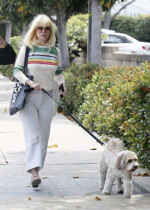 Alice Eve walks her dog in Los Angeles
