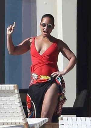 Alicia Keys in Red Swimsuit on the pool in Cabo San Lucas