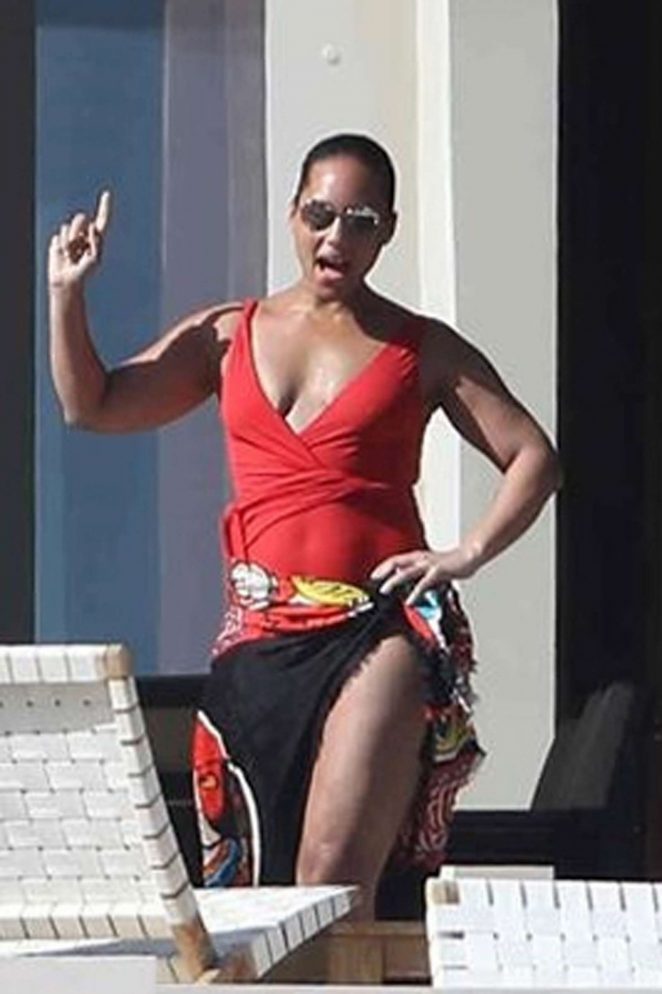 Alicia Keys in Red Swimsuit on the pool in Cabo San Lucas