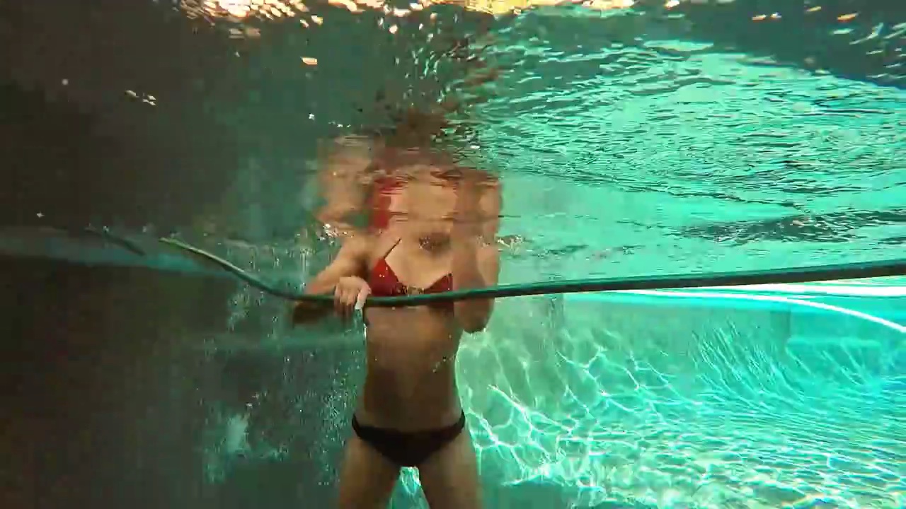 Allison Stokke 2015 : Allison Stokke pole vaulting in a pool-13. 