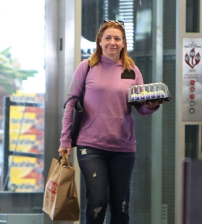 Alyson Hannigan - Buys a cake for her husband Alexis birthday in LA