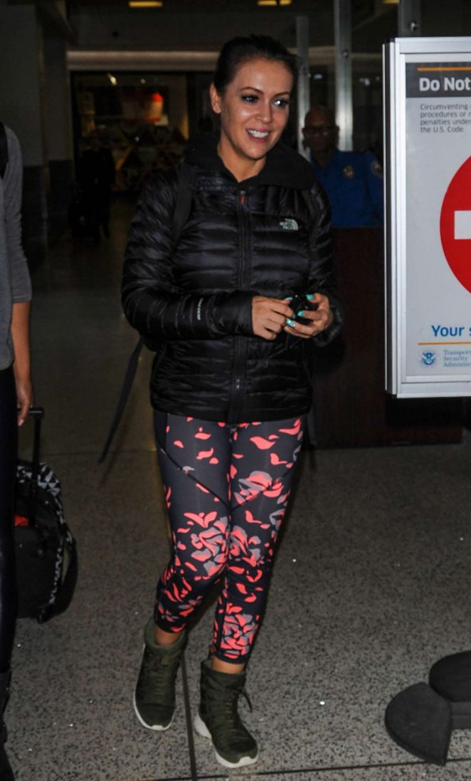Alyssa Milano in Tights at LAX Airport in Los Angeles