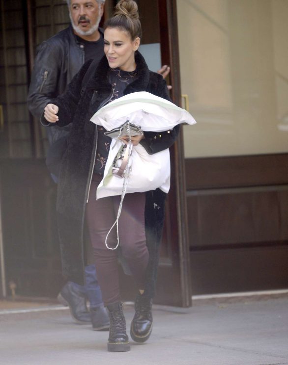 Alyssa Milano - Leaves her hotel with pillow in New York City